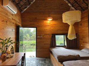 Postel nebo postele na pokoji v ubytování Hi Bungalow