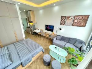 TV/trung tâm giải trí tại Dr 502 Modern Studio With City View And Kitchen
