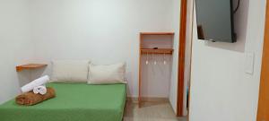 Letto o letti in una camera di Bambu Hostel