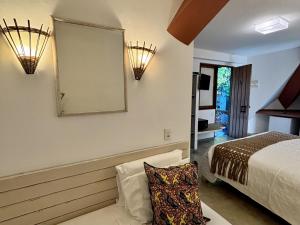 Katil atau katil-katil dalam bilik di Hotel Pousada Pitinga