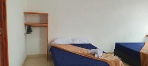 Letto o letti in una camera di Bambu Hostel