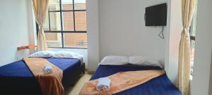 Letto o letti in una camera di Bambu Hostel