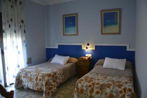 Posteľ alebo postele v izbe v ubytovaní Hotel Sierra de Araceli Lucena