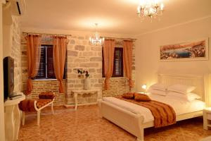 Katil atau katil-katil dalam bilik di Apartments Kotor Old Town