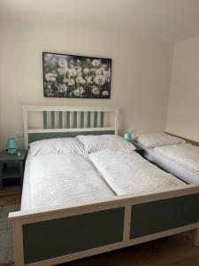 Llit o llits en una habitació de Mikulov Inn - hotel Zeme