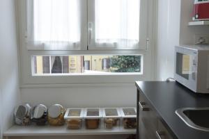 Кухня или мини-кухня в B&B Roma Olimpic
