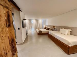 Katil atau katil-katil dalam bilik di Hotel Pousada Pitinga