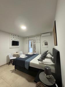 Postel nebo postele na pokoji v ubytování Villa Šimović