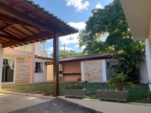 an outside view of a house with a patio at Sollar Imperial in Diamantina