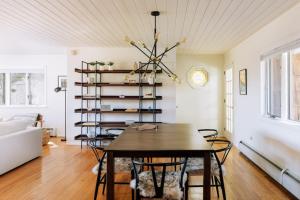a dining room with a table and chairs at Catskills Arthouse - 15 mins to Skiing in Margaretville