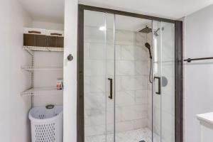 a shower with a glass door in a bathroom at Poolside Oasis close to Bucknell in Lewisburg +14 photos