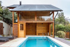 Bazén v ubytování Atardeceres del Lago - Alojamientos con Vista al Lago Villa La Angostura nebo v jeho okolí