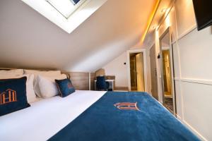 Postel nebo postele na pokoji v ubytování Hotel Ideja