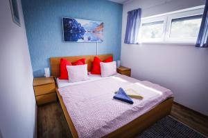 Postel nebo postele na pokoji v ubytování Apartments Relax