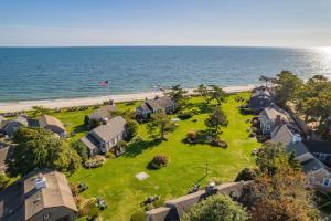 an aerial view of a house on the beach at Seaside Cottages - Cottage 23 - SeaGills Rest in South Yarmouth