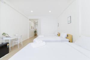 Katil atau katil-katil dalam bilik di 72 House & Cafe