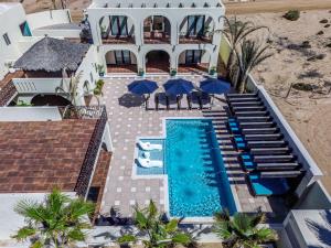 an aerial view of a house with a swimming pool at Paz del Mar Room 08 Flamenco in Las Conchas
