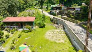 an overhead view of a yard with an umbrella at Sisney River Retreat in Rongli