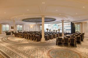 a banquet hall with chairs and tables in a room at InterContinental Paris Le Grand by IHG in Paris