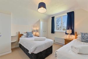 Voodi või voodid majutusasutuse Honeyfield Lodge - Spacious Cottage Rural Views toas