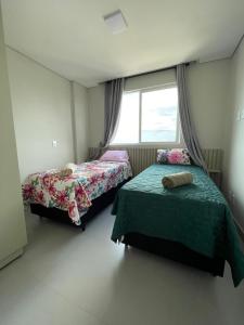 Postel nebo postele na pokoji v ubytování R02 - 806 Apto Tucano