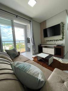 TV a/nebo společenská místnost v ubytování R02 - 806 Apto Tucano