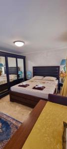 Ένα ή περισσότερα κρεβάτια σε δωμάτιο στο Mar'Elle Studio