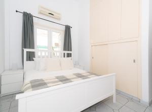 Ένα ή περισσότερα κρεβάτια σε δωμάτιο στο Cosy Downtown Apartment