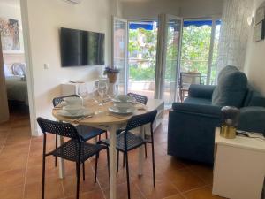 TV a/nebo společenská místnost v ubytování APARTAMENTO EN EL CENTRO CERCA DE La PLAYA