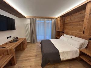 Postel nebo postele na pokoji v ubytování Agritur Bella di Bosco