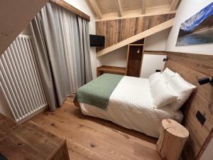 Postel nebo postele na pokoji v ubytování Agritur Bella di Bosco