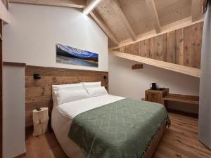 Postel nebo postele na pokoji v ubytování Agritur Bella di Bosco