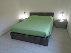 Giường trong phòng chung tại Appartamenti C&M Al Cortile vicino Venezia e Aeroporto VCE