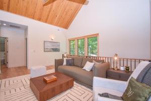 a living room with a couch and a table at Eagle's View in Dadeville