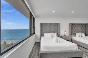 Postel nebo postele na pokoji v ubytování Luxury 2BD Penthouse with Beach Access and Resort Amenities PH6 + 36 fotografií