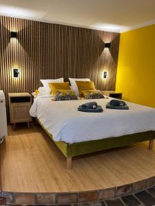 B&B Maison des Etoiles Chambre d'hôtes Adult Only客房内的一张或多张床位