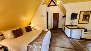Katil atau katil-katil dalam bilik di Hotel Pousada Pitinga