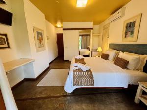 Katil atau katil-katil dalam bilik di Hotel Pousada Pitinga