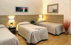 Postel nebo postele na pokoji v ubytování Dama Hotel + 37 fotografií