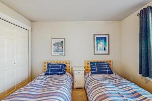 Giường trong phòng chung tại Family Beach Condo +26 ảnh