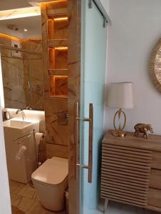 Koupelna v ubytování Olympia Corfu + 14 fotografií