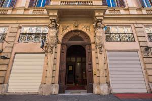 an entrance to a building with two garage doors at The Club Navona in Rome