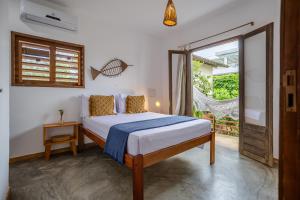 Ένα ή περισσότερα κρεβάτια σε δωμάτιο στο Wara Jeri Flats