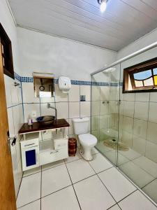 Ένα μπάνιο στο Hospedagem Braga - acomodação domiciliar