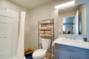 a bathroom with a toilet and a sink and a mirror at Saratoga Retreat about 3 Mi to Saratoga Lake! in Saratoga +18 photos