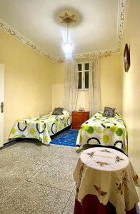 Postel nebo postele na pokoji v ubytování La casita de Larache