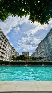 Πισίνα στο ή κοντά στο Oasis Suites Staycation