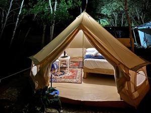Postel nebo postele na pokoji v ubytování BACALAR INN Hotel