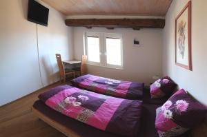 Ein Bett oder Betten in einem Zimmer der Unterkunft Bed and Breakfast Wegmann