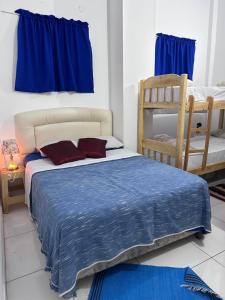 Voodi või voodid majutusasutuse Tu Hostal Alojamientos por día toas